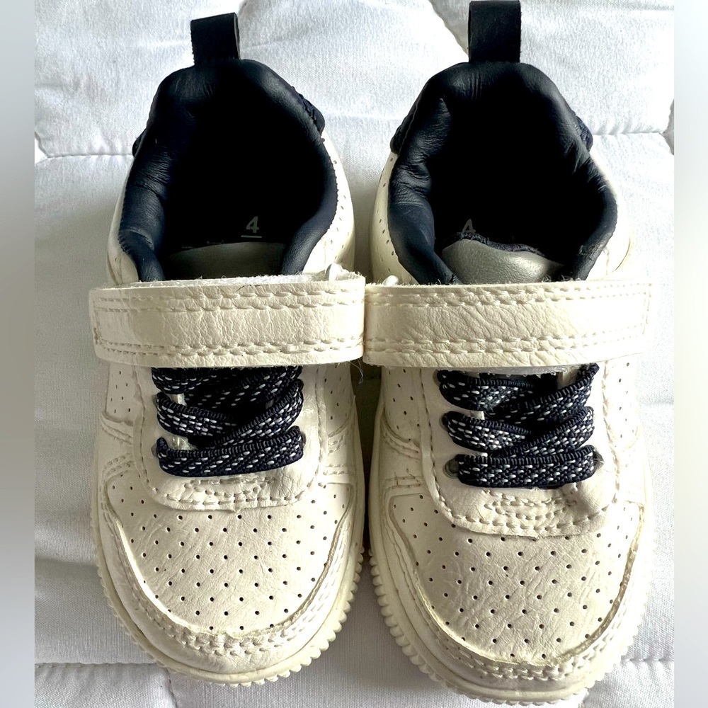 Carters white shoes! Size 4, with Velcro across the top :)